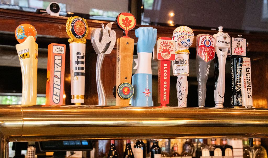 Craft beer taps at The Ivy